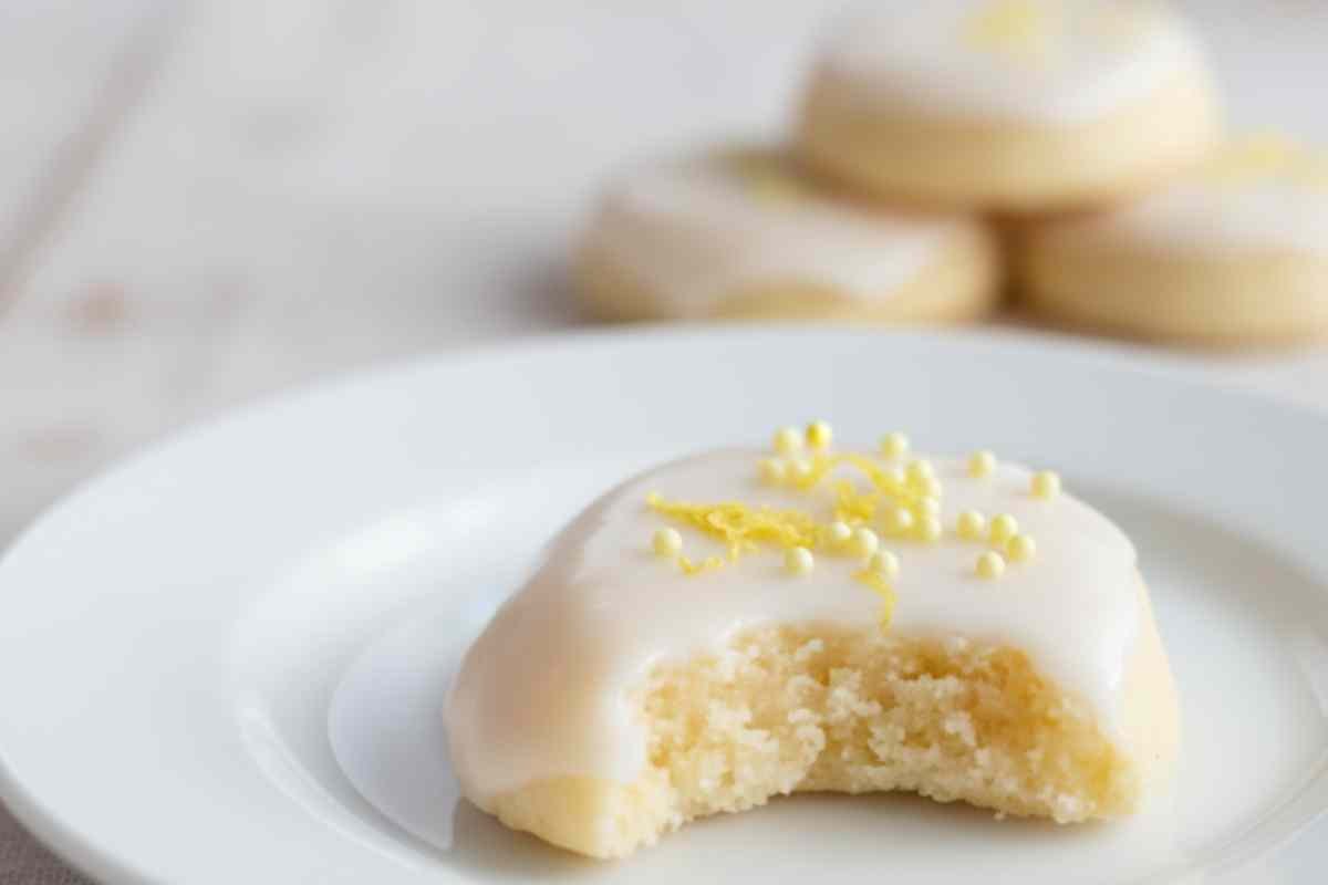 Plate of soft lemon meltaway cookies with lemon glaze ready to serve