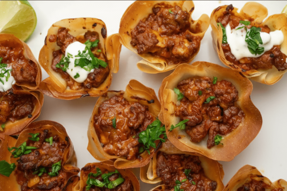 golden taco ranch bites filled with seasoned ground beef and cheddar cheese in crispy phyllo cups